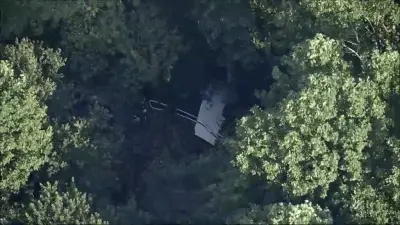 Skydiving plane goes off New Jersey runway and crashes into woods, sending 15 to hospital