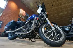 Does Minnesota require adults to wear helmets on motorcycles?